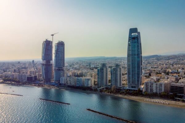 LIMASSOL, CY - Sep 02, 2022: The high-rise buildings along the serene waterfront in Limassol. Cyprus